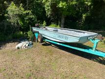 River Rat Jon Boat and Trailer with a 2002 15 HP Mercury Motor