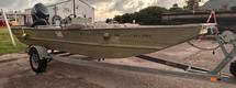 Boat With Outboard Engine and Trailer